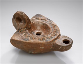 Lamp; South Anatolia, Anatolia; 1st - 4th century; Terracotta; 3.2 x 7.5 x 9.7 cm, 1 1,4 x 2 15,16 x 3 13,16 in