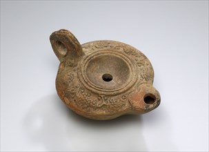 Lamp; South Anatolia, Anatolia; 1st - 4th century; Terracotta; 3.3 x 7.4 x 9.3 cm, 1 5,16 x 2 15,16 x 3 11,16 in