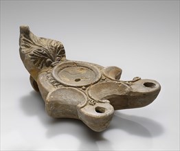 Lamp; Central Anatolia, Anatolia; 1st century B.C. - 4th century A.D; Terracotta; 3.8 x 8.5 x 15 cm, 1 1,2 x 3 3,8 x 5 7,8 in