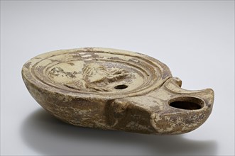 Lamp; North Africa, Tunisia; second half of 1st century; Terracotta; 2.3 × 7.5 × 10.5 cm, 7,8 × 2 15,16 × 4 1,8 in