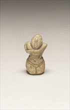 Standing Female Figure with Crossed Arms; Thessaly?, Greece; 6th - 5th millennium B.C; Terracotta; 5.1 x 3 x 2.4 cm