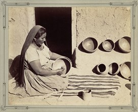 Woman Polishing Pottery; John K. Hillers, American, 1843 - 1925, 1879; Albumen silver print