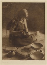 The Potter; Edward S. Curtis, American, 1868 - 1952, 1906; Gravure; 39.2 x 28.8 cm 15 7,16 x 11 3,8 in