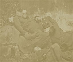 Soldiers lying on ground; French; about 1870; Albumen silver print