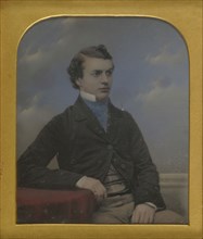 Portrait of a Young Man Seated at Table; Richard Beard, English 1801 - 1885, about 1852; Daguerreotype, hand-colored