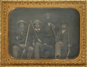 Portrait of four men with rifles; American; 1850s; Daguerreotype