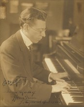 Homer Grunn at the Piano; Louis Fleckenstein, American, 1866 - 1943, 1916; Toned gelatin silver print; 23.5 x 18.5 cm