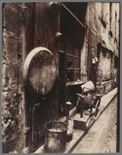 Tinsmith's Shop, rue de la Reynie; Eugène Atget, French, 1857 - 1927, Paris, France; 1912; Gelatin silver chloride printing-out
