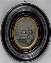 Portrait of a French daguerreotypist from Lyon with his equipment; French; about 1850; Daguerreotype