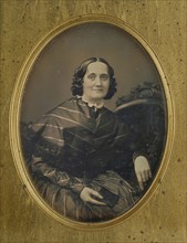 Portrait of a Seated Middle-aged Woman Holding a Book; Southworth & Hawes, American, active 1844 - 1862, about 1850