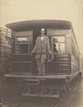 Portrait of an  man standing on rear platform of a train; American; about 1863; Salted paper print; 19.5 x 15.4 cm