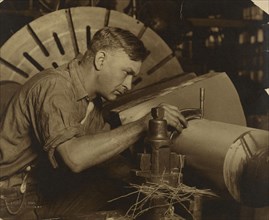 Man with Micrometer Measuring a Shaft to a Thousandth of an Inch; Lewis W. Hine, American, 1874 - 1940, United States