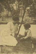 Gertrude O'Malley and Charles seated by a stream; Gertrude Käsebier, American, 1852 - 1934, New York, New York, United States
