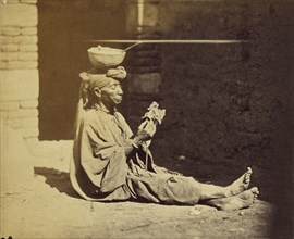 Portrait of seated beggar, probably near Cairo; Attributed to Baron Paul des Granges, French ?, active Greece 1860s, 1860