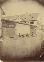 Figures with carts along road; European; about 1870 - 1880; Albumen silver print