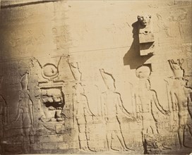 Wall with relief sculptures of ancient Egyptian figures; Egypt; about 1860 - 1880; Tinted Albumen silver print