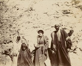 Woman with men and camel; about 1860 - 1880; Tinted Albumen silver print