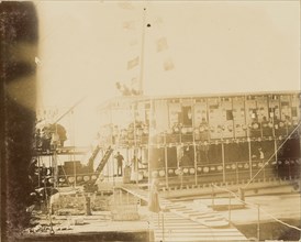 Barge lined with lanterns; about 1860 - 1880; Tinted Albumen silver print