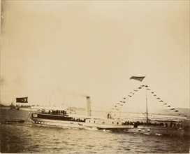Boat adorned with flags; about 1860 - 1880; Tinted Albumen silver print