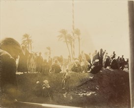 Group of people at edge of pit; about 1860 - 1880; Tinted Albumen silver print