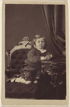 Boy wearing a Fauntleroy suit; about 1869; Carbon print