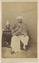 Hindu man in turban, seated; about 1865; Albumen silver print