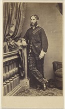 man with moustache and muttonchops, standing; about 1865; Albumen silver print