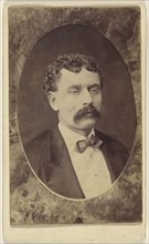 man with moustache, in quasi-oval format; about 1865; Albumen silver print