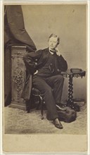 young man, seated; Kiesling Brothers; 1860s; Albumen silver print