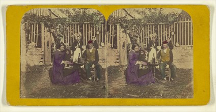 Genre scene: family seated outside aorund a table with glasses and a bottle of wine; London Stereoscopic Company, active 1854