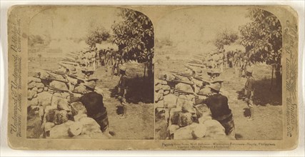 Fighting from Stone Wall Defences - Washington Volunteers - Taquig, Philippines; Underwood & Underwood, American, 1881 - 1940s