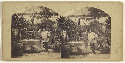 Man wearing cap standing in garden near a well; Henry Van Der Helle, French, active 1870s, about 1877; Albumen silver print