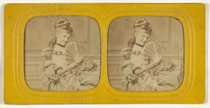 Woman seated on a divan holding a hand fan; E. Lamy, French, active 1860s - 1870s, 1860s; Hand-colored Albumen silver print