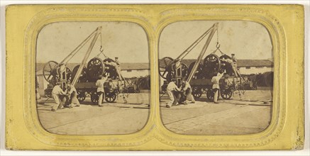 Men loading large iron wheels on platform; about 1865; Hand-colored Albumen silver print