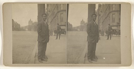Black man posed on street at light pole, Albany, N.Y; Julius M. Wendt, American, active 1900s - 1910s, 1900s; Gelatin silver