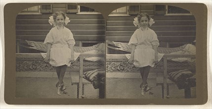 Mildred E. Wendt in yard, 427 1st St., Albany, N.Y; Julius M. Wendt, American, active 1900s - 1910s, 1900s; Gelatin silver