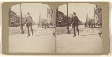 Elder white-bearded man with derby walking on Albany, N.Y. street; Julius M. Wendt, American, active 1900s - 1910s, 1900s