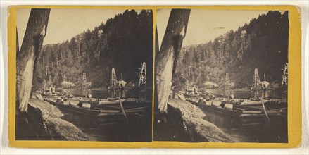 Large rafts on river loaded with barrels, derricks on shore; Attributed to Julius M. Wendt, American, active 1900s - 1910s