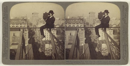 Photographing New York City - on a slender support 18 stories above pavement of Fifth Avenue; Underwood & Underwood, American