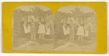 Group of people playing a game, one man is blindfolded; about 1855 - 1860; Albumen silver print