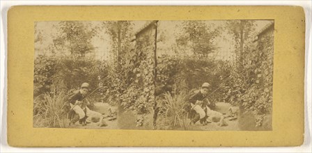 Boy in riding outfit playing in garden; about 1860; Albumen silver print
