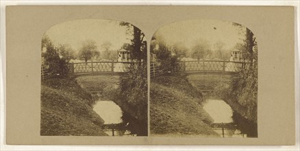 Woman crossing footbridge over stream; British; about 1860; Albumen silver print