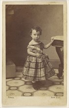 Young girl standing with hand on table; Mathew B. Brady, American, about 1823 - 1896, about 1865; Albumen silver print