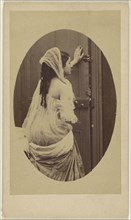 Woman with bare-shoulder gown with hand against a door preventing someone from entering; about 1865; Albumen silver print
