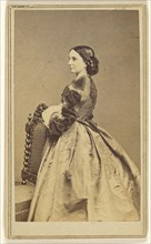 Full-length portrait of an  woman in profile; Charles DeForest Fredricks, American, 1823 - 1894, September 20, 1864; Albumen