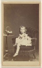 Little girl posed and seated; London Stereoscopic and Photographic Company; about 1873; Albumen silver print