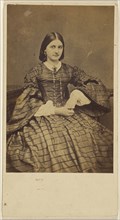 Young woman in striped dress, seated; 1860s; Albumen silver print