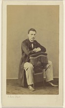 Man with moustache, seated, with front to back of fringed chair; Alexandre Ken, French ?, active 1860s, 1860s; Albumen silver