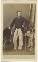 Man with muttonchops, standing; Schwarzschild & Co; 1860s; Albumen silver print