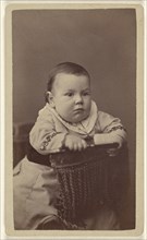 Baby posed in chair; Alexander Hesler, American, born Canada, 1823 - 1895, 1870s; Albumen silver print